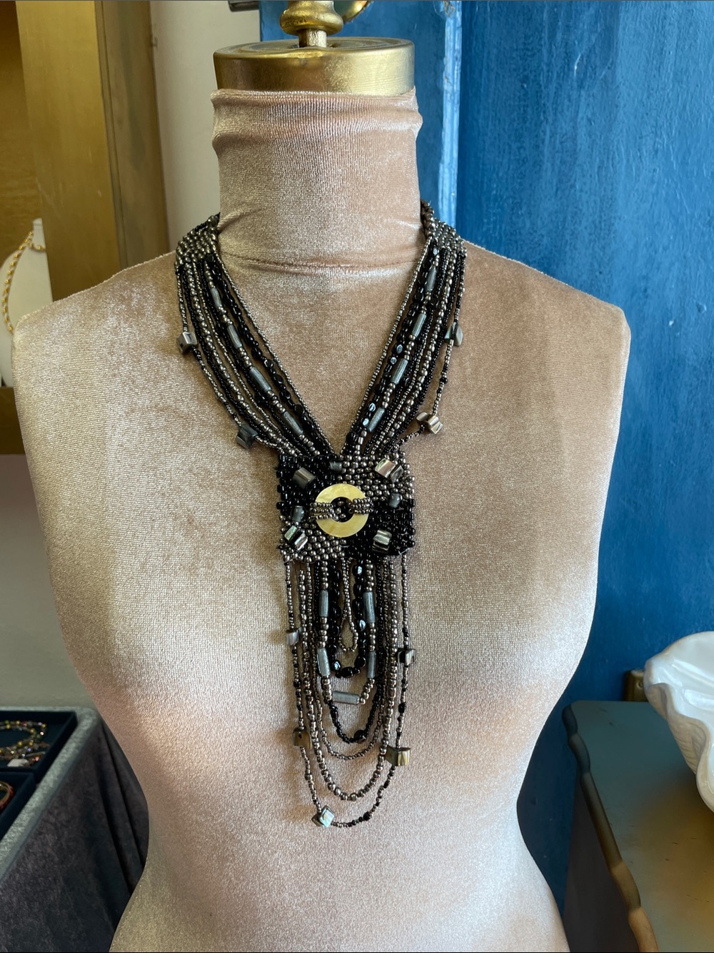 Multi-Strand Black Beaded Statement Necklace with Gold Accent